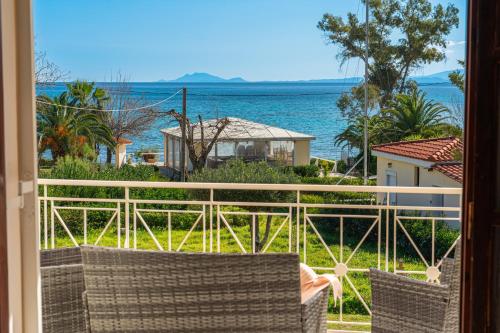 a view of the ocean from a balcony at Southbank seafront apartments in Katelios