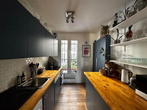 Photo de la galerie de l'établissement Charmant Appartement Parisien, à Paris