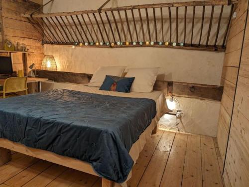 Cama o camas de una habitación en Logement - Studio indépendant à Pérouges