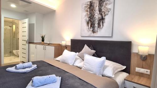Posteľ alebo postele v izbe v ubytovaní Spa Residence Carbona 101, 307 Apartman