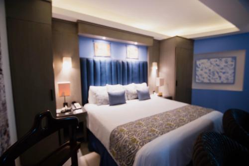 Hotel HBlue Centroにあるベッド