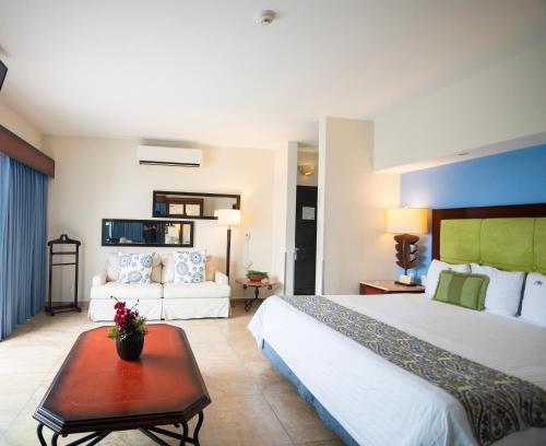 Postel nebo postele na pokoji v ubytování Hotel HBlue Centro