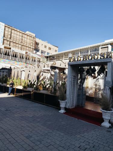 a building with a gate with plants in it at Gentle Breeze Studio 2 in Amman