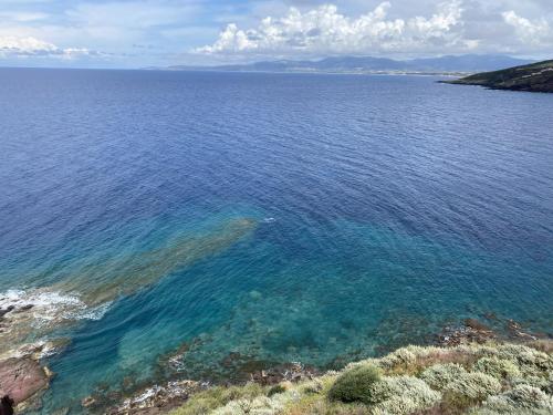 an aerial view of a large body of water at L'Attico Blu - Affitti Brevi Italia in Valledoria