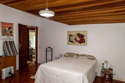 Ένα ή περισσότερα κρεβάτια σε δωμάτιο στο Do Sítio Tinoca