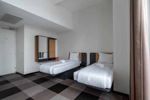 Katil atau katil-katil dalam bilik di easyHotel Maastricht City Centre