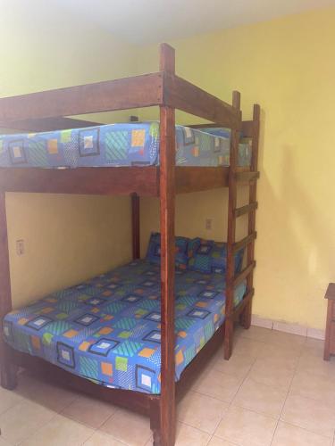 a couple of bunk beds in a room at Hotel Las Salinas in Zihuatanejo