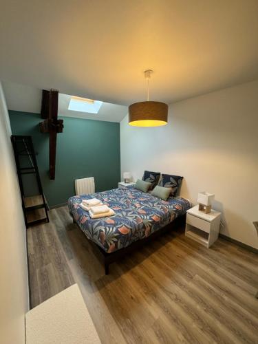 Katil atau katil-katil dalam bilik di Appartement Cosy dans le coeur de Witry-les-Reims