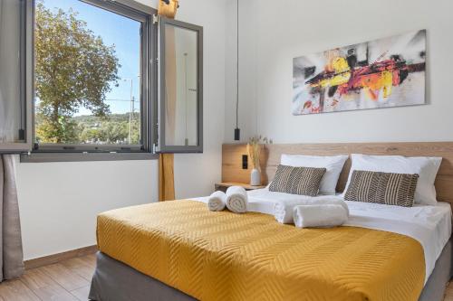 Postel nebo postele na pokoji v ubytování Dimargi Apartments