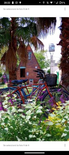 a group of bikes parked in front of a house at Ala de Colibri in Ramallo