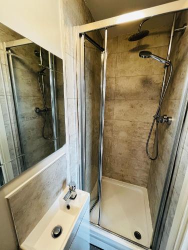 a bathroom with a shower and a sink at 31 重點 