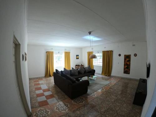Zona de estar de Jacobsen Bungalow in Maun, Boronyane