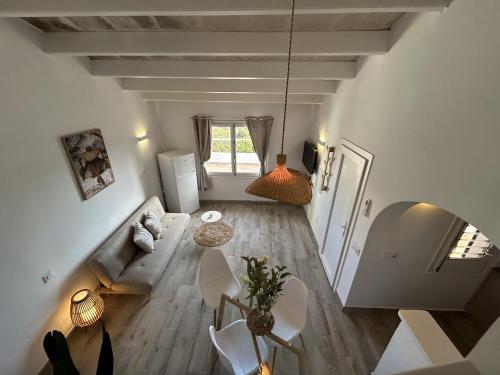 a living room with a couch and a table at Apartamentos Islanders in Cala en Forcat