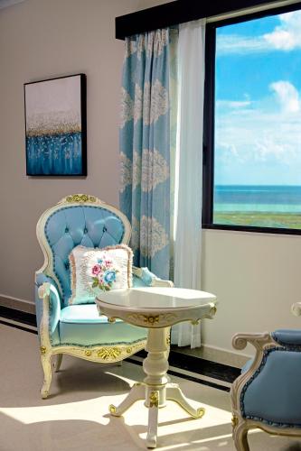 Posezení v ubytování Golden Bay Belize Hotel