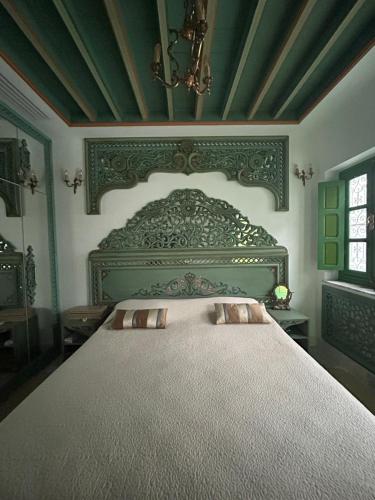 Ein Bett oder Betten in einem Zimmer der Unterkunft Dar Waya