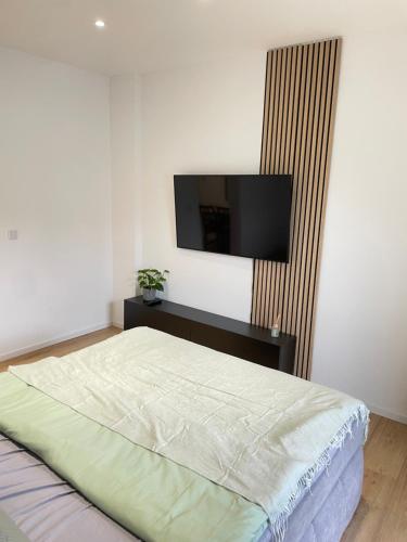 Televisyen dan/atau pusat hiburan di Moderne Wohnung in Unna Mitte