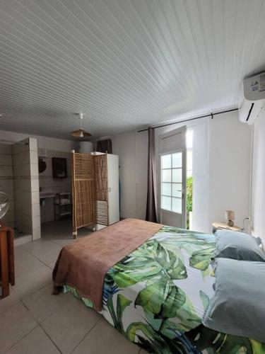Ένα ή περισσότερα κρεβάτια σε δωμάτιο στο Tropical urban
