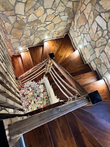 an overhead view of a staircase with a stone wall at Chata pod Starou Horou in Trstená