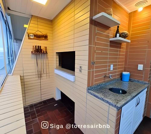 Dapur atau dapur kecil di Apto vista mar | 200mts da praia | Quatro Praças