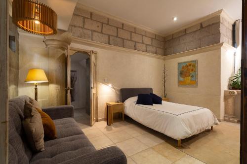 Ένα ή περισσότερα κρεβάτια σε δωμάτιο στο Loft in Casa Xaha