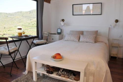 Ένα ή περισσότερα κρεβάτια σε δωμάτιο στο 2 bedrooms house with terrace and wifi at Santa Cruz de Tenerife 5 km away from the beach