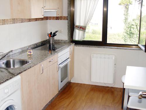 a kitchen with a sink and a counter top at Hotel Villanueva San Jorge de Heres in Villanueva