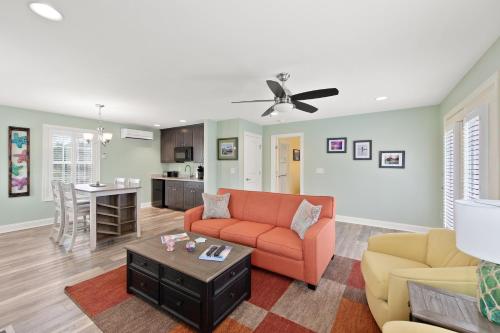 a living room with a couch and a table at The Homestead B&B in Rehoboth Beach