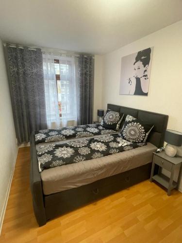 מיטה או מיטות בחדר ב-A&A Apartments