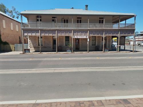 an empty street in front of a building at Austral Inn in Quorn