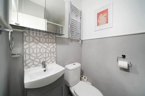Ett badrum på Soho Apartments F4