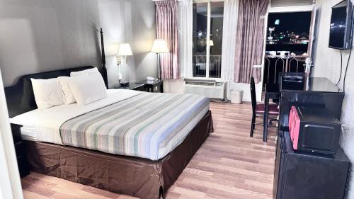 Ένα ή περισσότερα κρεβάτια σε δωμάτιο στο Mountain Home Inn