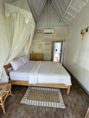 Llit o llits en una habitació de The Layar Homestay