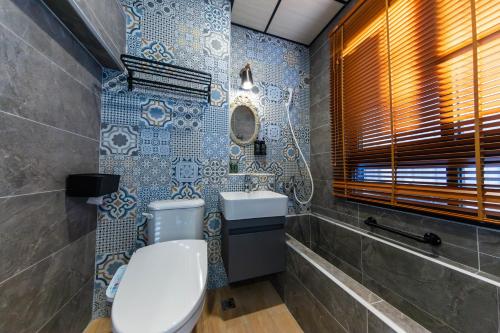 Vannituba majutusasutuses EZ STAY Yancheng