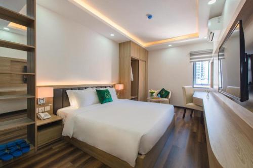 En eller flere senge i et værelse på ANNA Beach Nha Trang