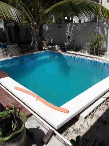 a large swimming pool with a whitevisor around it at Casa Pepe Vacation Rental Progreso in Progreso