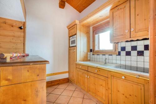 Kuchyňa alebo kuchynka v ubytovaní Résidence Les Alpages de Chantel - maeva Home - Appartement duplex 3 Pièces 6 Personnes - Sélection MAE-1638