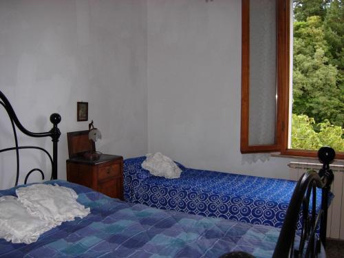 Lova arba lovos apgyvendinimo įstaigoje Il Pino Amiata