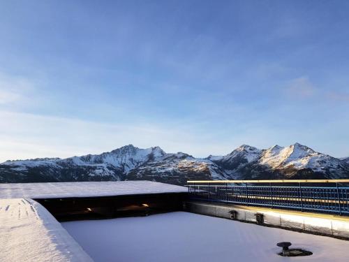 Photo de la galerie de l'établissement Résidence Roc Belleface C - Agréable et spacieux quatre pièces équipé pour 10 personnes avec vue panoramique dans une résidence avec piscine et sauna MAE-1655, à Arc 1600