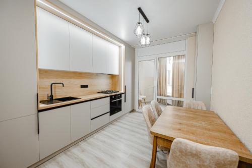 Køkken eller tekøkken på Modern Escape in Chisinau