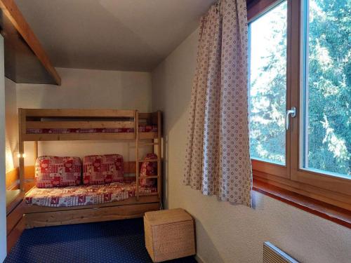 Postel nebo postele na pokoji v ubytování Résidence Nova - Studio 3 personnes, proche des pistes et des commerces, au cœur de la station d’Arc 1800 dans le village des Villards MAE-1852