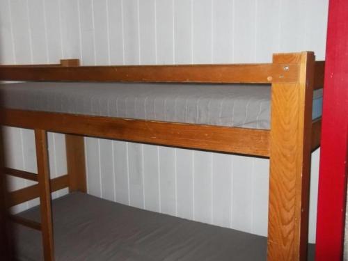 a bunk bed in a room with a mattress at Résidence Rond-Point-pistes I - Studio pour 6 Personnes 044 in Orcières