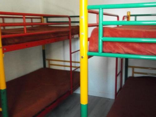 a group of bunk beds in a room at Résidence Rond-Point-pistes I - 2 Pièces pour 6 Personnes 174 in Orcières