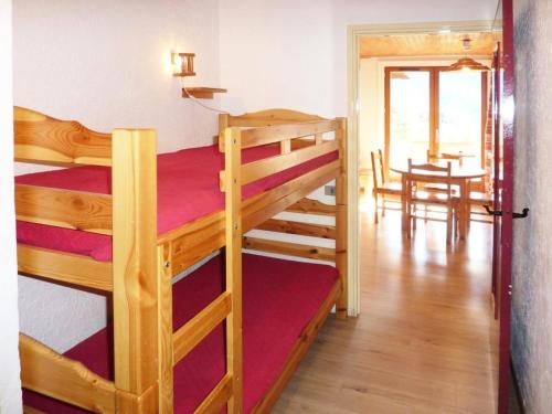 Ένα ή περισσότερα κρεβάτια σε δωμάτιο στο Résidence L'horizon - Résidence L'Horizon en coeur de station. MAE-0574