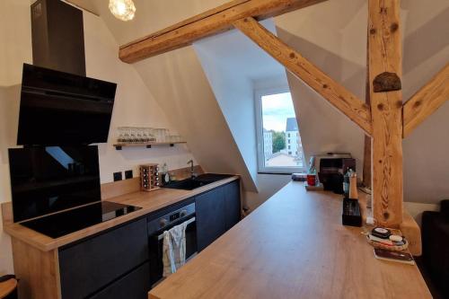 A kitchen or kitchenette at Appartement Strasbourg