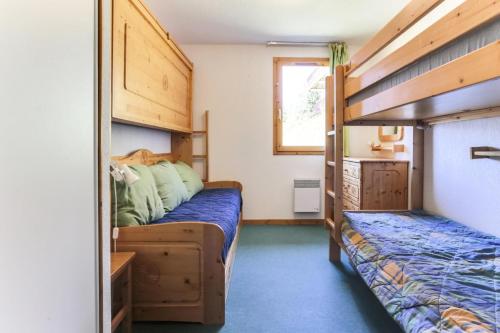 Posteľ alebo postele v izbe v ubytovaní Résidence Presles - Appartement duplex de charme 4 pièces 8 personnes à Vallandry dans un quartier calme et proche des pistes MAE-2004