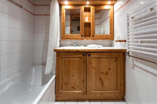 Ванная комната в Résidence Les Fermes de Méribel - maeva Home - Appartement 3 Pièces 5 Pers 25
