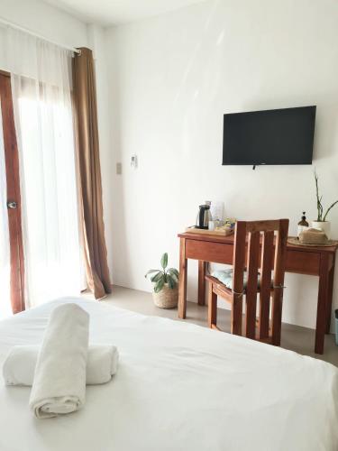 148 Guesthouse and Resortにあるテレビまたはエンターテインメントセンター