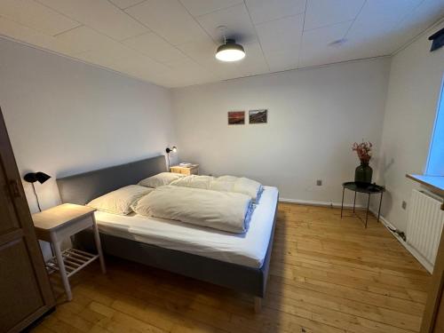 Letto o letti in una camera di Illu Rental - Green House with Iceberg view