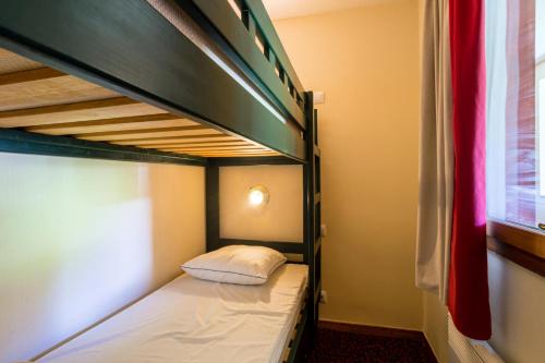 Katil dua tingkat atau katil-katil dua tingkat dalam bilik di Résidence L'Alpaga - maeva Home - Studio 4 personnes - Budget 514