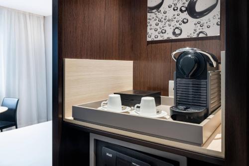 a coffee machine in a hotel room at AC Hotel Madrid Feria by Marriott in Madrid